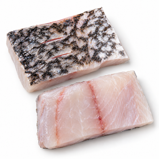 Two broad skin-on barramundi portions on white, one showing the skin and one showing the flesh