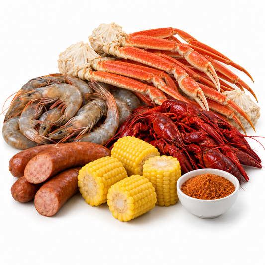 Seafood boil with crawfish, snow crab, shrimp, sausage and corn — ingredients on white background